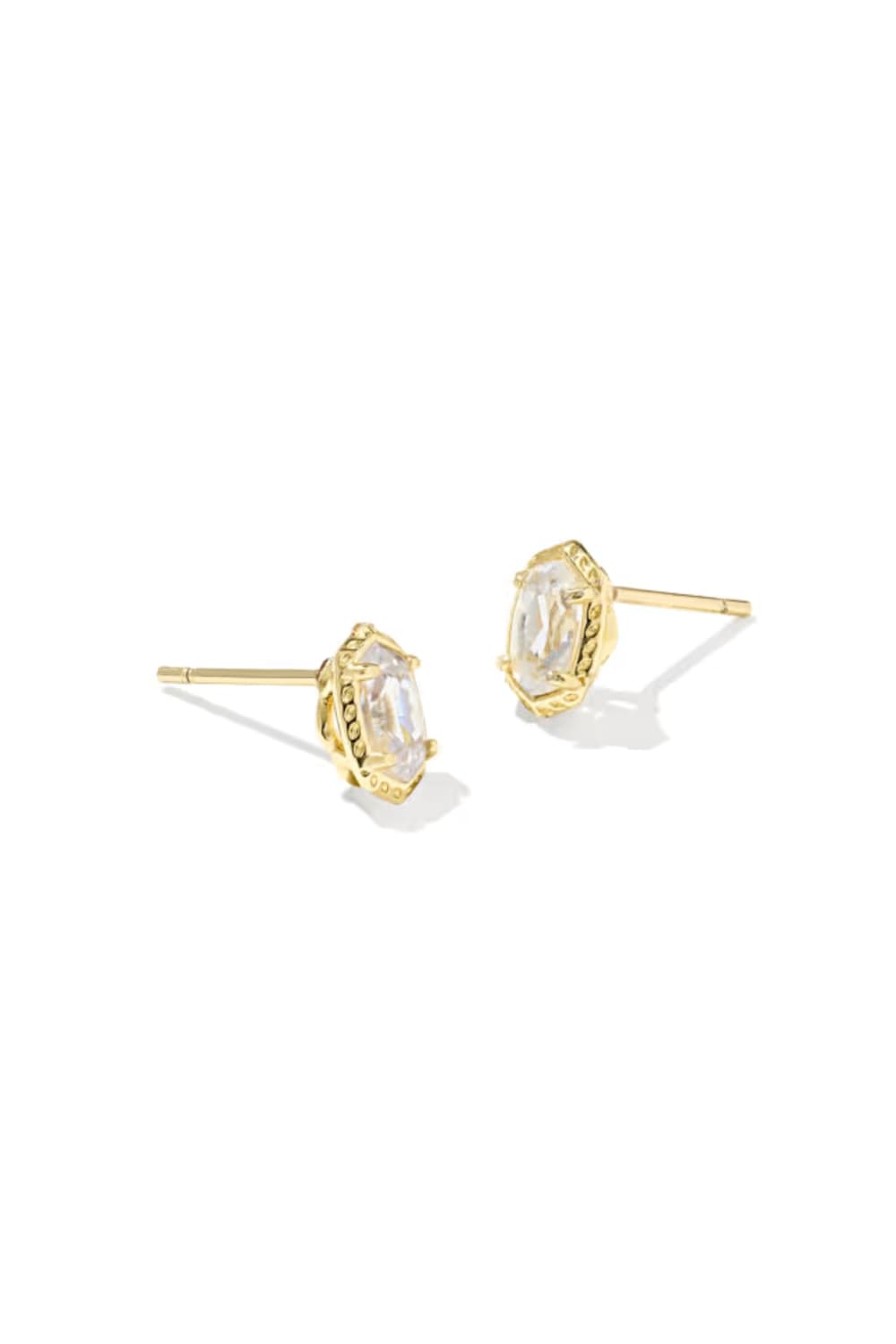 Gold earrings with a white background
