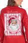 A woman wearing a red long-sleeve shirt, viewed from the back. The shirt features a large graphic print of Santa Claus inside a pink and white scalloped frame, with the words 'Believe' and 'simply southern collection' printed on the back.