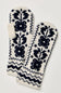 A pair of knit fingerless mittens with a dark navy blue Fair Isle pattern on an off-white background, displayed against a light neutral background.
