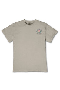 A light beige crewneck t-shirt with a small multicolor graphic on the left chest, displayed flat against a white background.