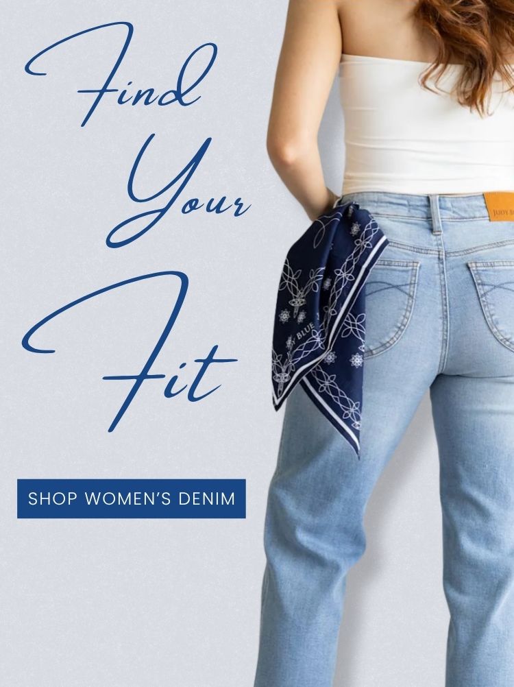 Promotional mobile banner showing the back view of a woman wearing light-wash denim jeans and holding a navy patterned scarf. The text reads "Find Your Fit" with a "Shop Women's Denim" call-to-action button.