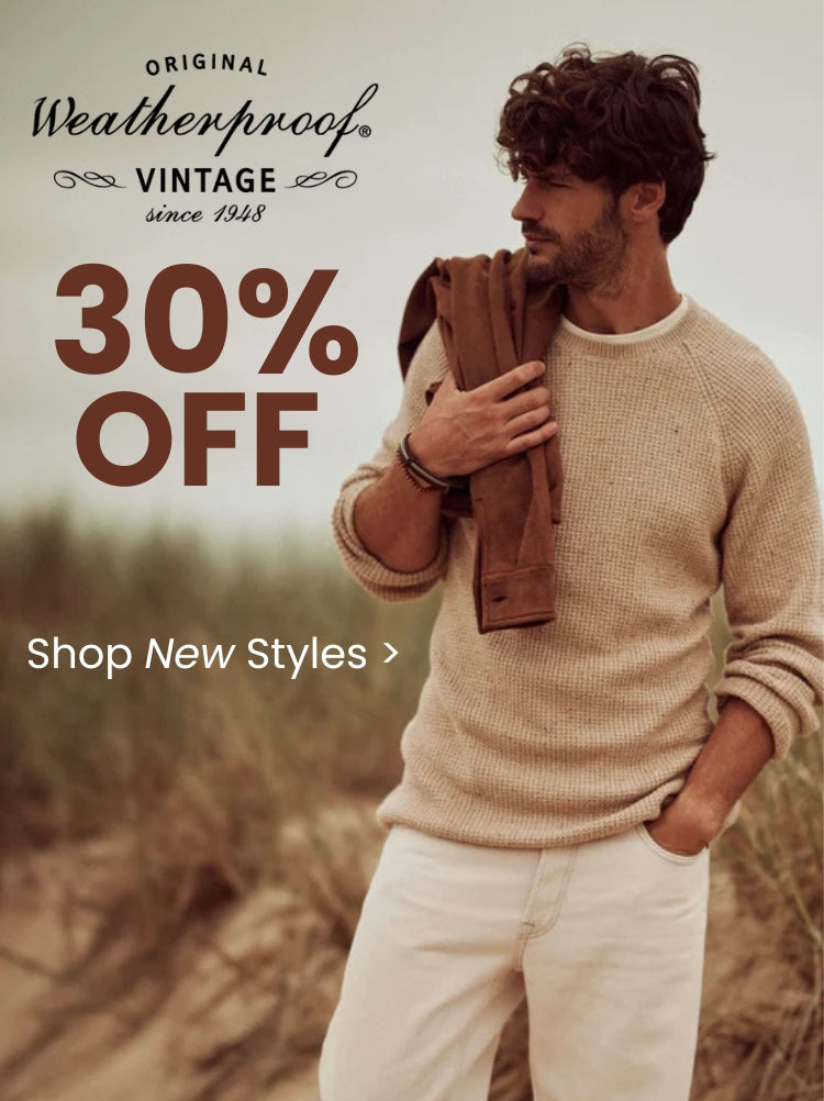 A promotional banner featuring a man standing outdoors wearing a tan sweater, white pants with a brown jacket over his shoulder. Text features ORIGINAL Weatherproof VINTAGE since 1948 brand logo 30% OFF and a Shop New Styles call to action