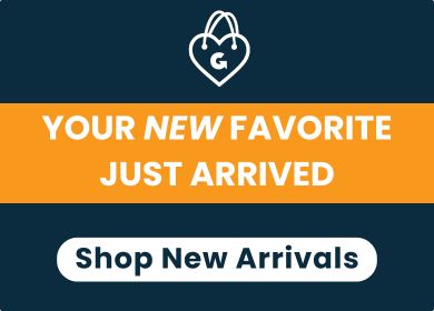 Navy blue banner that reads "Your New Favorite Just Arrived" and "Shop New Arrivals" with a white oval background