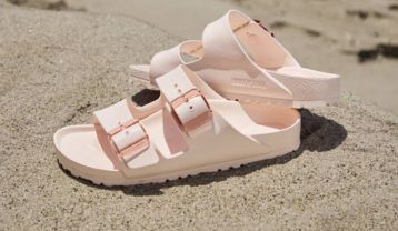 Light Rose Birkenstock EVA sandals on sand