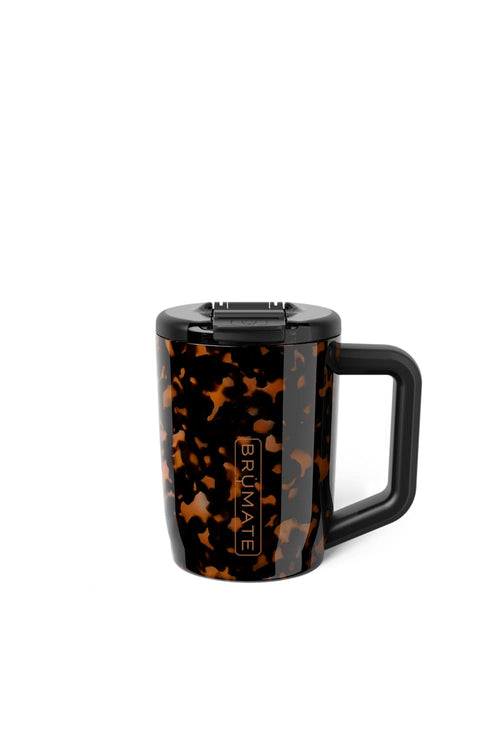 A travel mug with a black and brown tortoiseshell pattern, featuring a black handle, black lid, and the vertical brand 