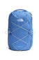A blue The North Face Jester backpack with white bungee cords crisscrossed on the front, shown against a plain white background.