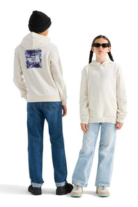 Two models wearing off-white hoodies, shown from the back and front respectively, against a plain white studio background. The model on the left wears a black beanie, blue jeans, and black shoes, while the model on the right wears sunglasses, light-wash jeans, and white sneakers.