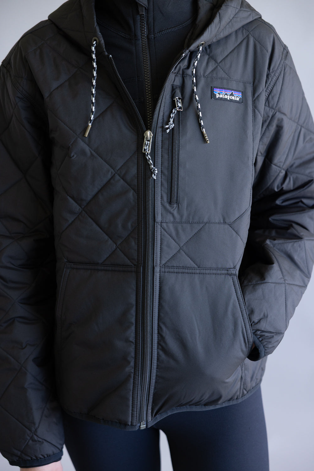 PATAGONIA-WOMENS-DIAMOND-QUILTED-BOMBER-HOODIE-JACKET-IN-BLACK-20696-BLK