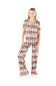 full body view of a girl wearing a matching pj set with nutcrackers all over