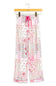 A pair of wide-leg pajama pants with a pink and white patchwork bohemian pattern, hanging on a wooden hanger against a white background.