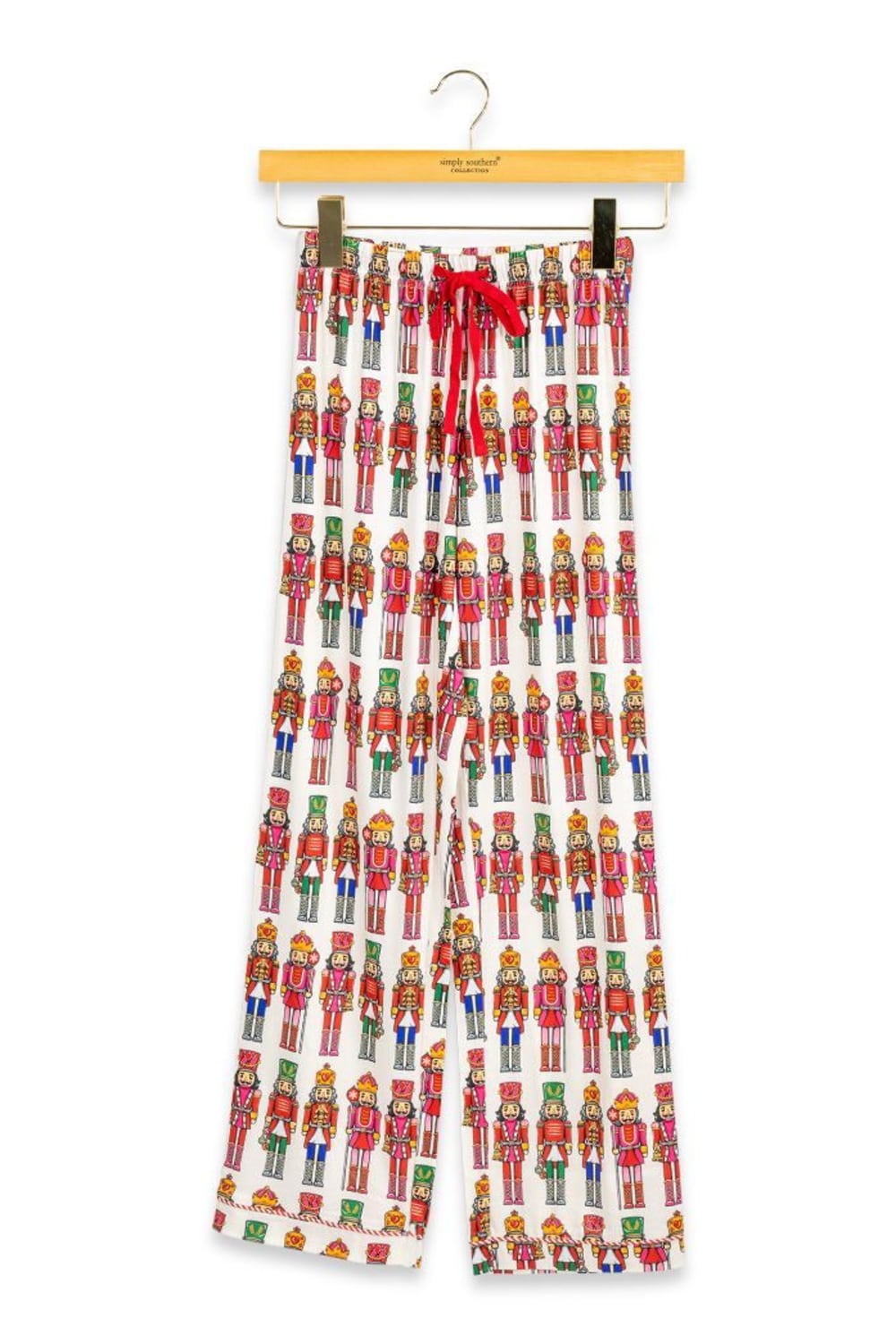 youth girls satin-like pajama pants with nutcrackers all over