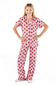 A young girl modeling a two-piece pajama set featuring a pink and red floral pattern, standing against a solid white background.