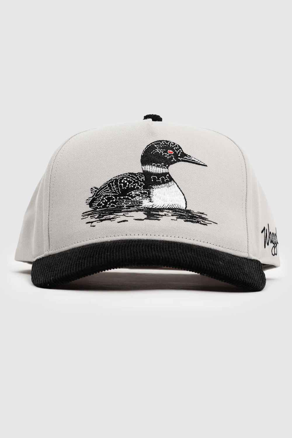 A light gray snapback cap with a black ribbed brim, featuring an embroidered loon on the front and a stylized script logo on the side.