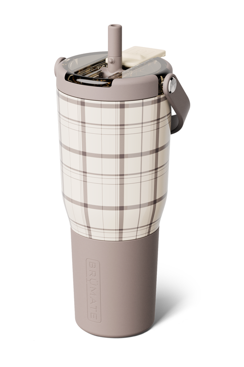 A plaid insulated travel tumbler with a matching beige lid and carry loop, shown on a clean white background.