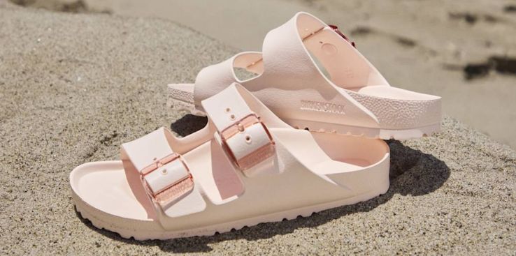 Light Rose Birkenstock EVA sandals on sand