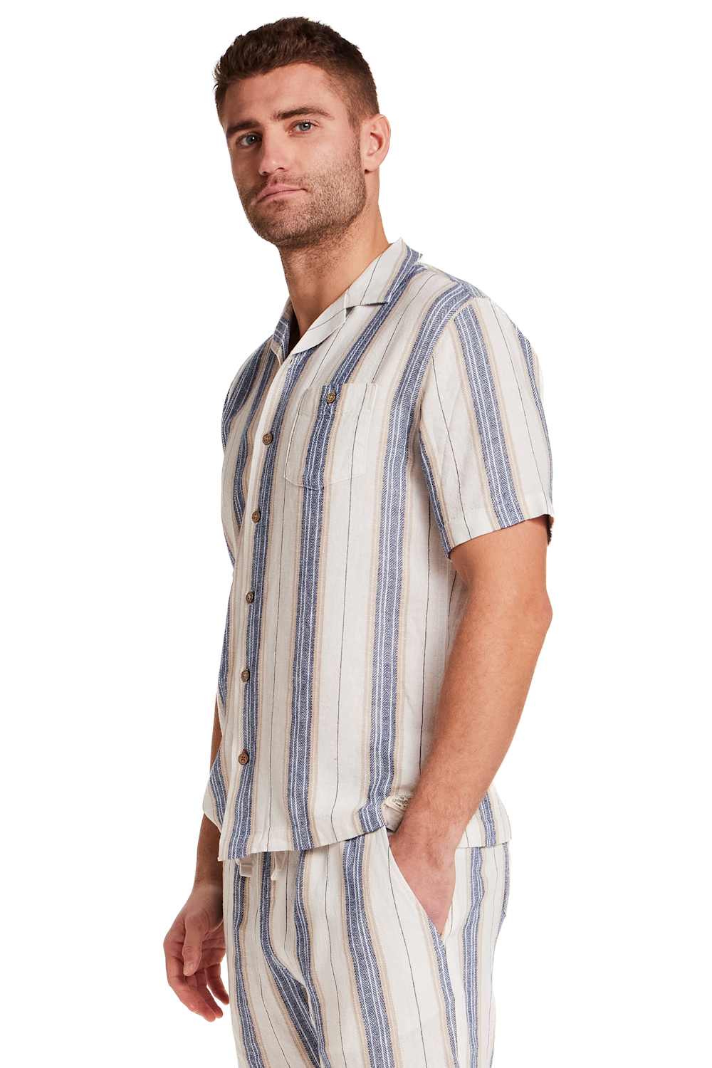 Weatherproof Vintage Linen Camp Shirt for Men in Blue Stripe; Man wearing a striped shirt and pants on a white background