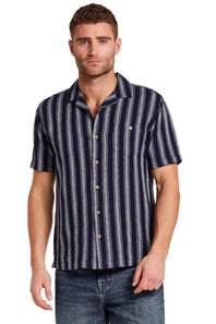 Weatherproof Vintage Linen Camp Shirt for Men in Navy Stripe; Man wearing a navy and white striped shirt on a white background