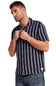 Weatherproof Vintage Linen Camp Shirt for Men in Navy Stripe; Man wearing a navy and white striped shirt on a white background