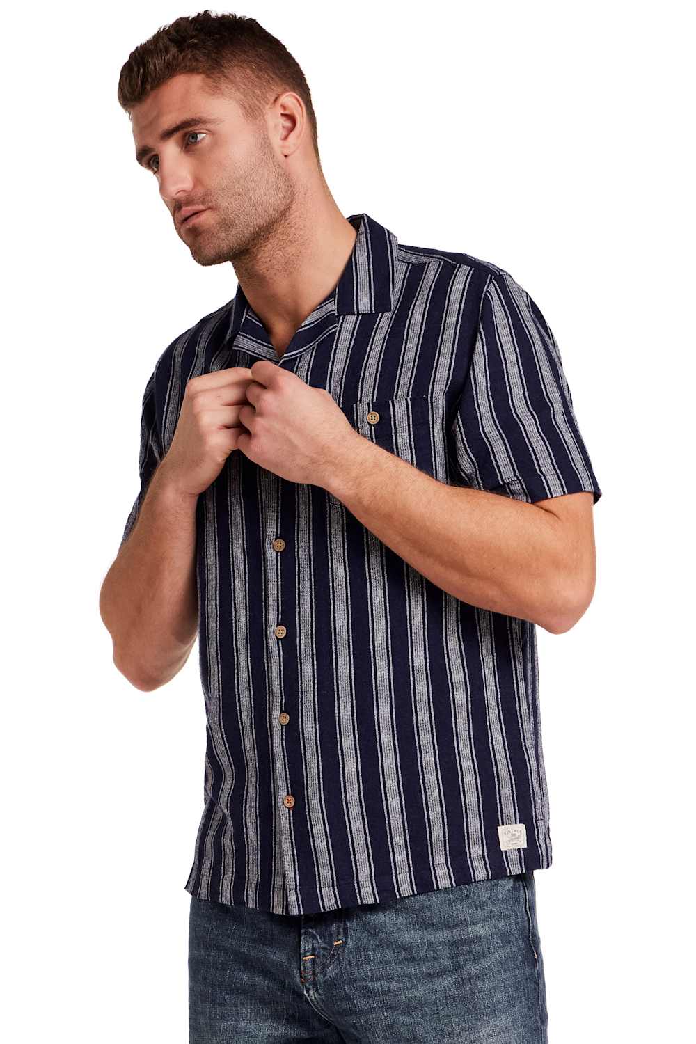 Weatherproof Vintage Linen Camp Shirt for Men in Navy Stripe; Man wearing a navy and white striped shirt on a white background