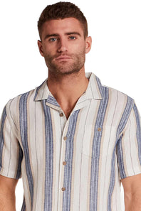 Weatherproof Vintage Linen Camp Shirt for Men in Blue Stripe; Man wearing a striped short-sleeve shirt on a white background
