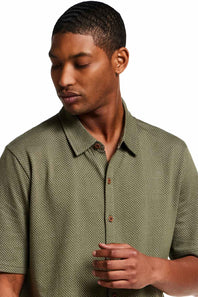 Weatherproof Vintage Neat Coat Knit Button Up Shirt for Men in Grapeleaf; Man wearing a green shirt against a white background
