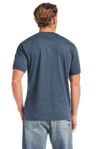 Weatherproof Vintage Jersey Henley Shirt for Men in Cobalt; Man wearing a blue t-shirt and jeans from behind on a white background 