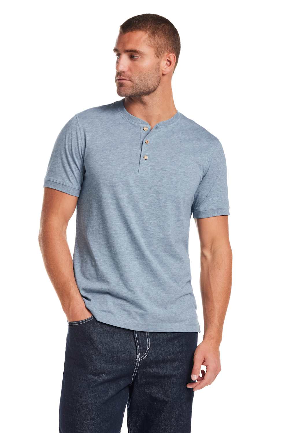 Weatherproof Vintage Jersey Henley Shirt for Men in Spring Wave; Man wearing a blue henley shirt and dark jeans on a white background