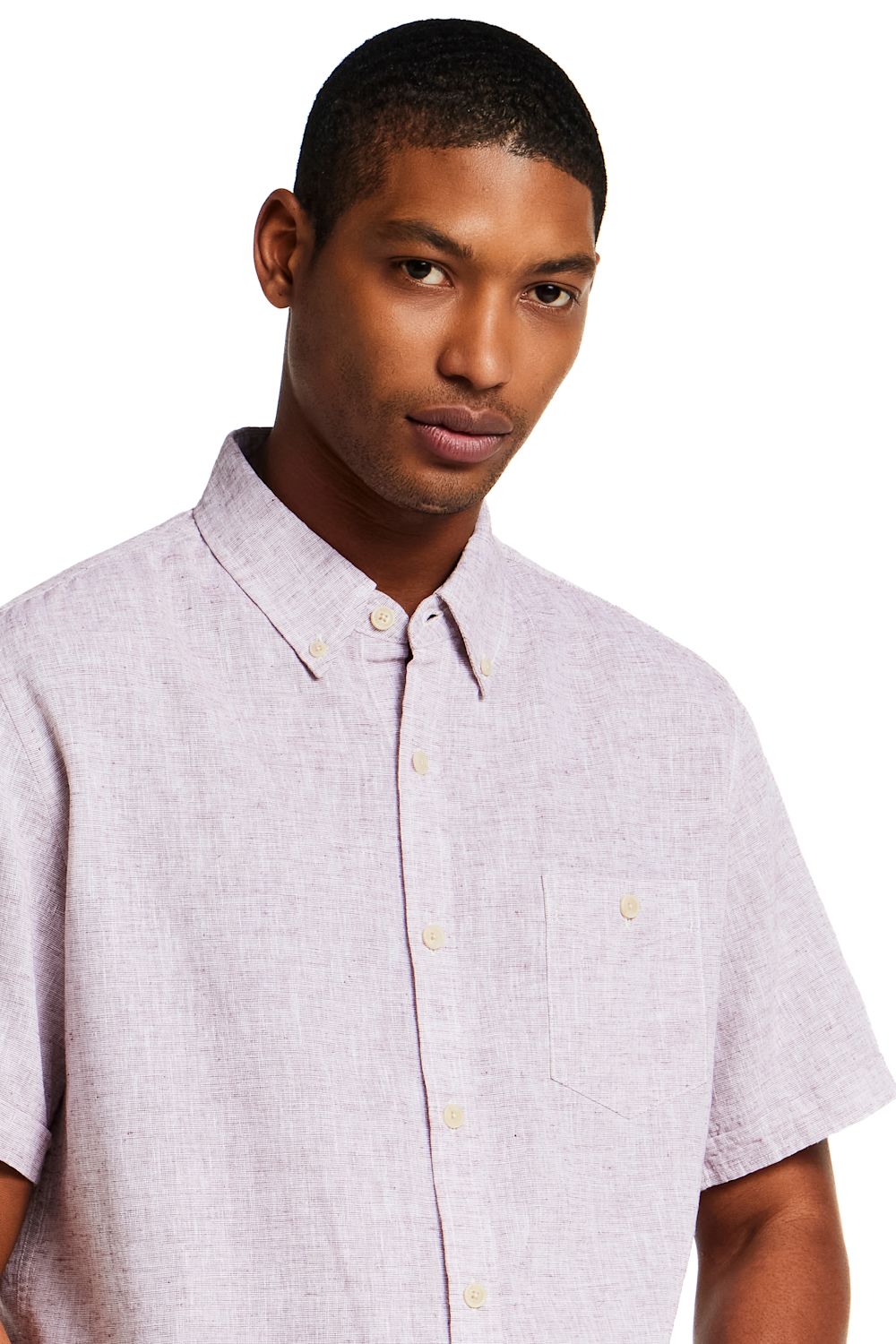 Weatherproof Vintage Cotton Linen Solid Button Down Shirt for Men in Rose; Man wearing a light purple short-sleeve shirt on a white background