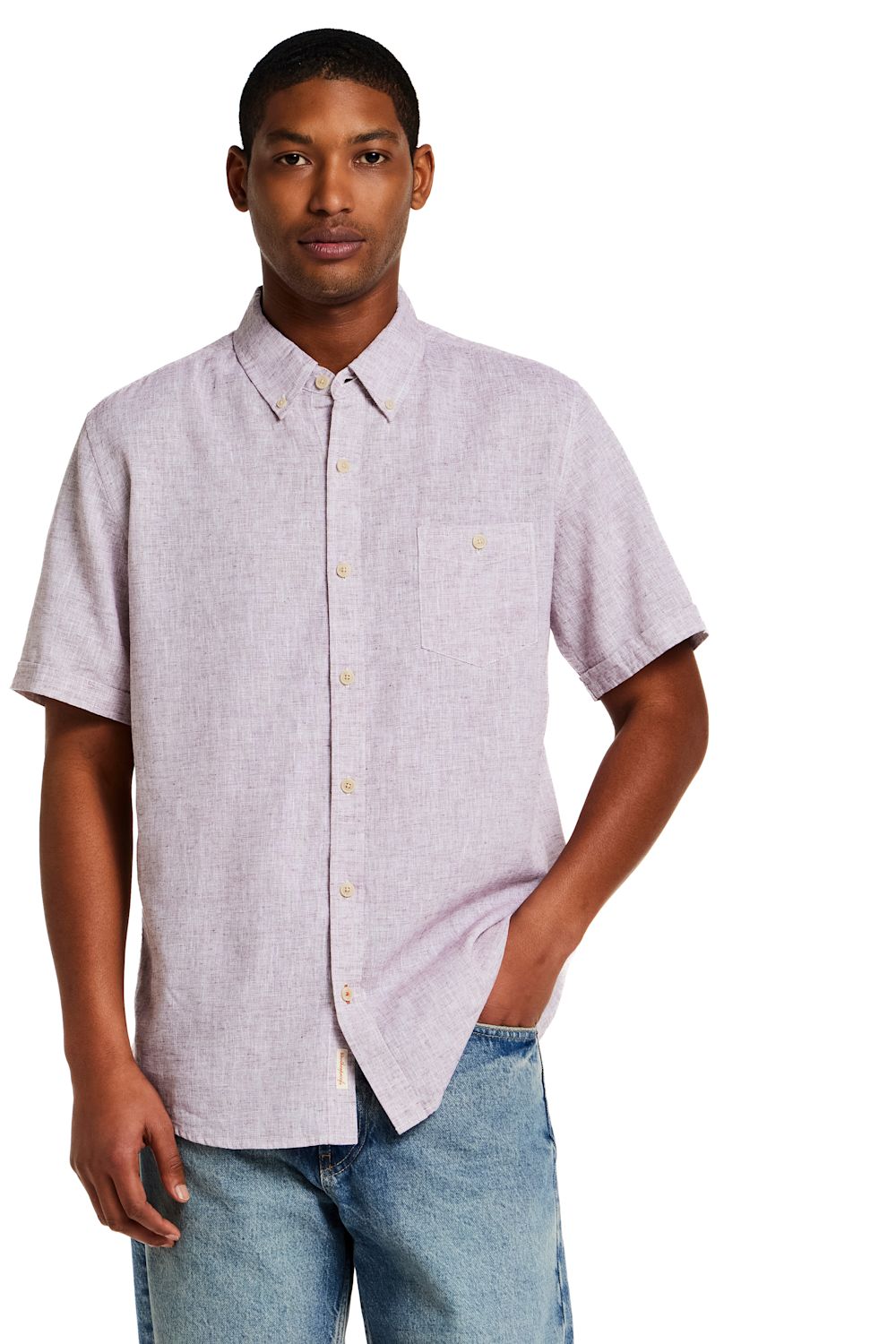 Weatherproof Vintage Cotton Linen Solid Button Down Shirt for Men in Rose; Man wearing a light purple short-sleeve shirt with white buttons on a white background
