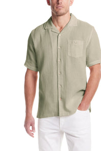 Weatherproof Vintage Cotton Airtex Shirt for Men in Seagrass; Man wearing a light green short-sleeve button-up shirt with a pocket on a white background