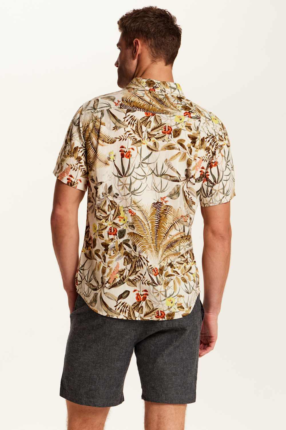 Weatherproof Vintage Camp Collar Printed Shirt for Men in Wheat; Man wearing a patterned shirt with a white background