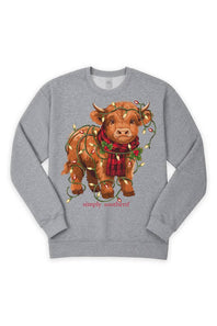 A heather gray crewneck sweatshirt featuring a graphic of a brown Scottish Highland cow wrapped in Christmas string lights and a red plaid scarf, with the text 'simply so cute!' printed below.