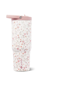 A Hydro Jug travel tumbler with a white background covered in a delicate pink and red floral pattern, featuring a light pink lid with a flip-up straw cover.
