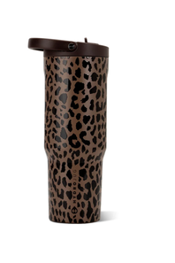 A stainless steel travel tumbler with a brown and black leopard print pattern, featuring a dark brown lid with a flip-up straw, shown on a white background.