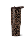 A travel tumbler with a brown and black leopard print pattern and a dark brown lid, shown on a plain white background.