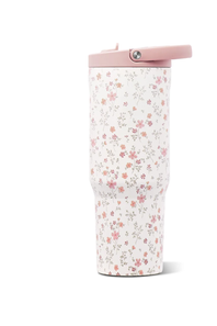A tall insulated travel tumbler with a white background covered in a dense small floral print in pink, coral, and muted green. It features a light pink flip-top lid with a silver metal button.