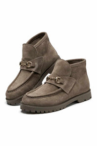 Project Cloud taupe suede bootie with a horsebit metal detail and lug sole