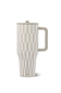 A travel tumbler with a handle and lid, featuring a vertical checkerboard pattern in beige and off-white, with a small vertical brand logo near the base.