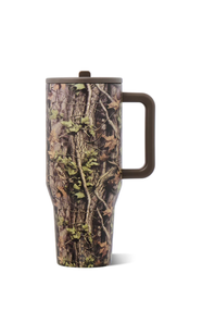 A tall insulated travel mug with a woodland camouflage pattern, featuring a dark brown handle and lid, shown on a plain white background.