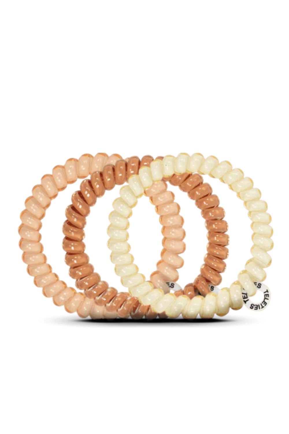 Set of three beaded bracelets in beige, brown, and white on a white background