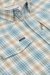 A close-up of a plaid button-down shirt by Donluo, featuring a light blue, beige, and white checkered pattern with a single chest pocket and silver snap buttons.