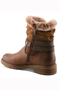 A brown leather ankle boot with a faux fur trim at the top, a side zipper, and a decorative strap with a buckle, shown against a plain white background.