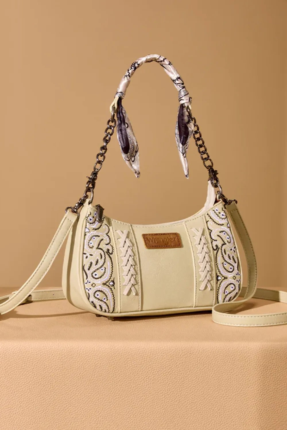 Wrangler Bandana Shoulder Purse for Women in Tan; Beige handbag with intricate patterns on a beige background