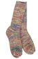A pair of hand-knit crew socks featuring a vibrant, multicolored variegated pattern of pink, blue, yellow, green, and purple yarn, displayed against a solid white background.