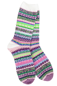A pair of crew socks with a colorful, multi-colored Fair Isle knit pattern featuring stripes of purple, pink, green, blue, and white on a clean white background.