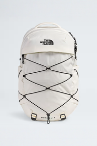 White backpack with black accents and 'The North Face' logo on a light gray background