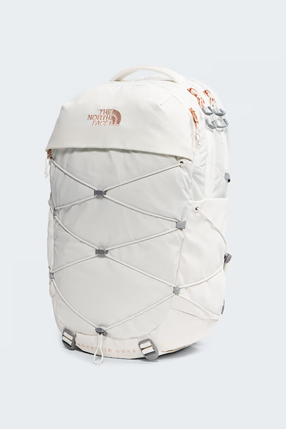 White backpack with The North Face logo on a light gray background