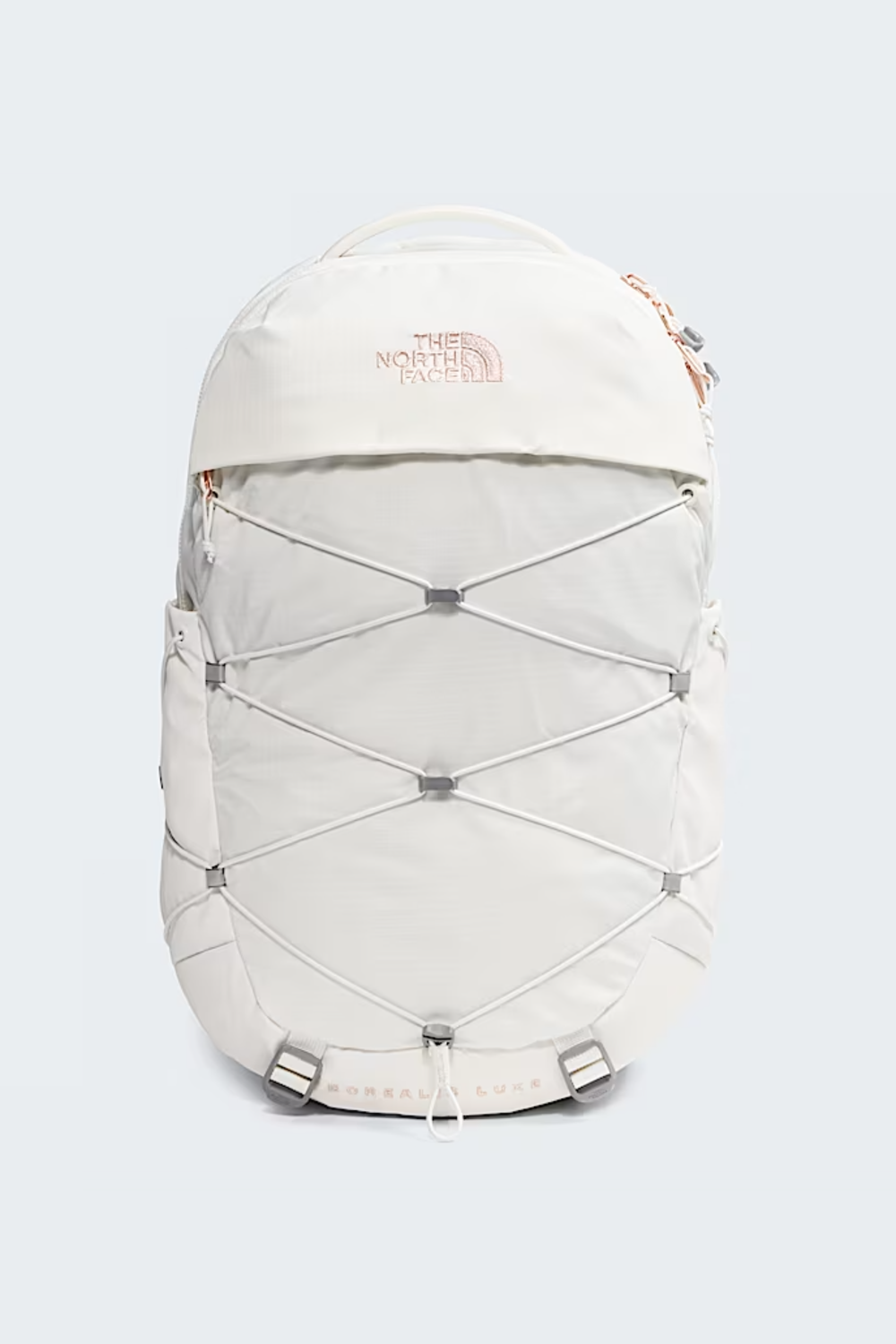 White backpack with 'The North Face' logo on a light gray background