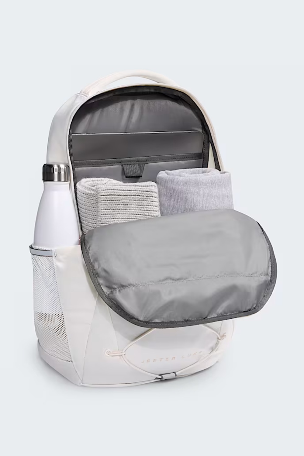 White TNF backpack with rose gold metallic details 