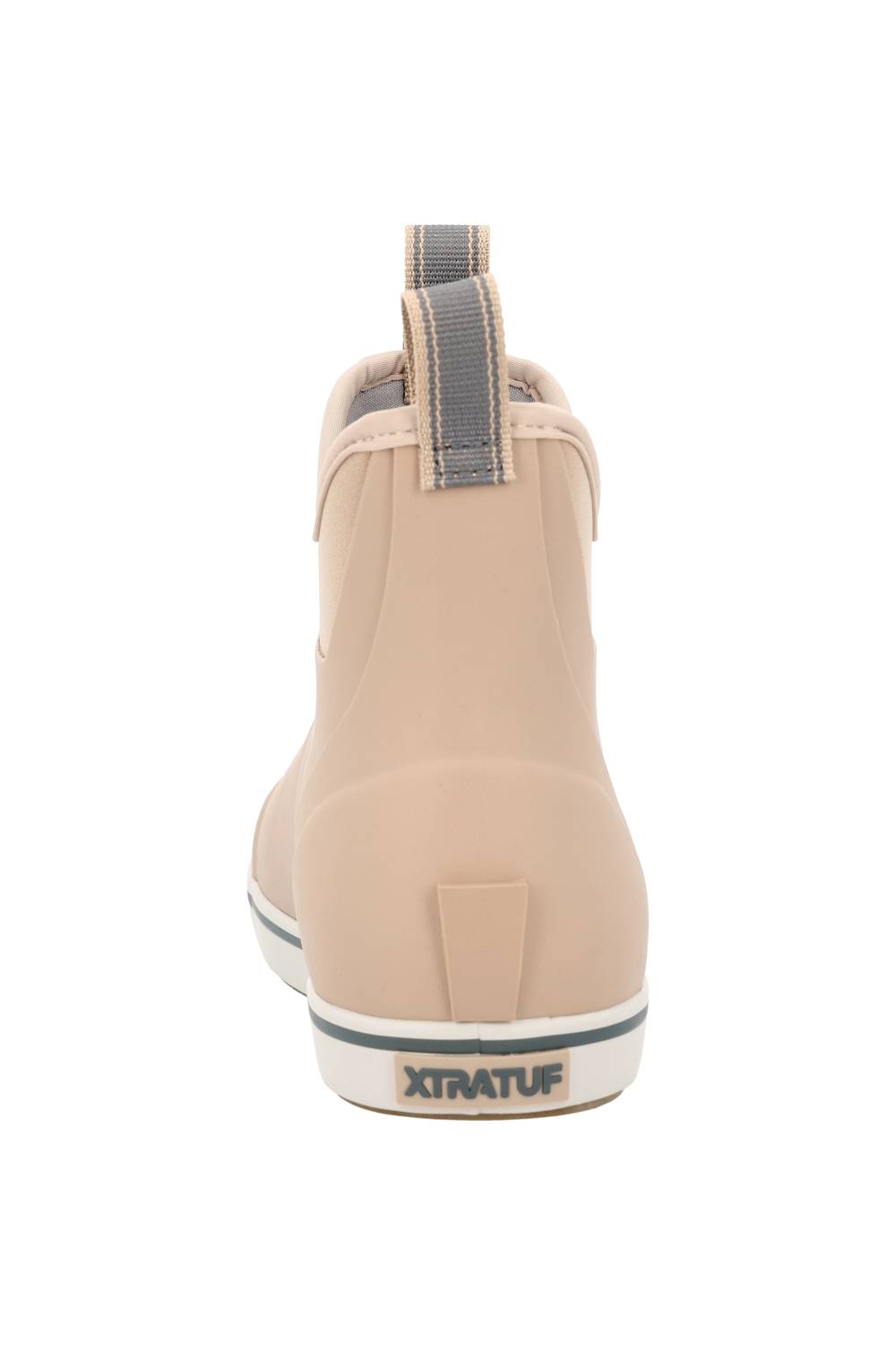 A single XtratuF ankle rain boot shown from the back, featuring a light beige nylon upper, a gray pull tab, and a white sole with a black stripe and XTRATUF branding.